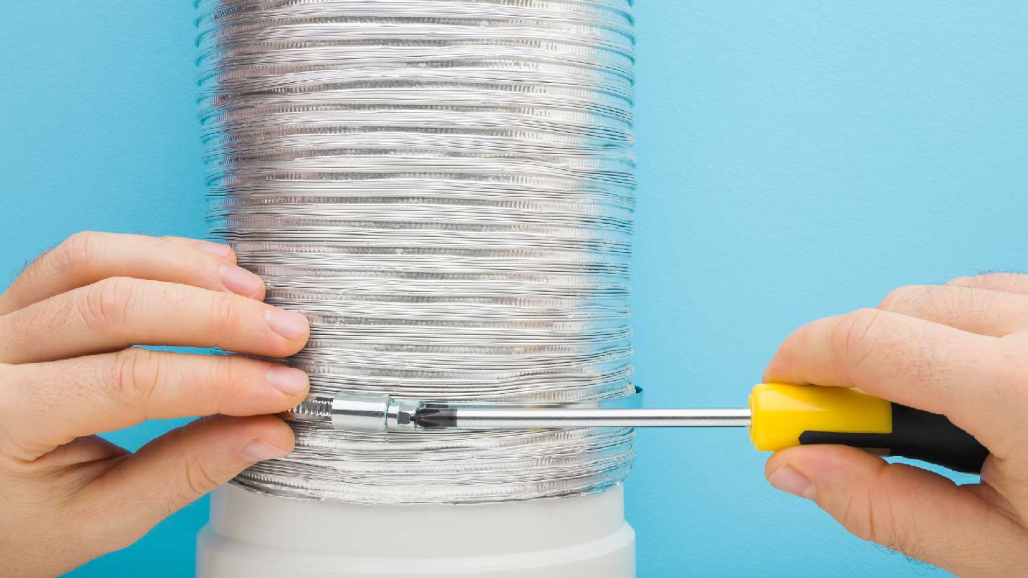 A person tightening vent clamps