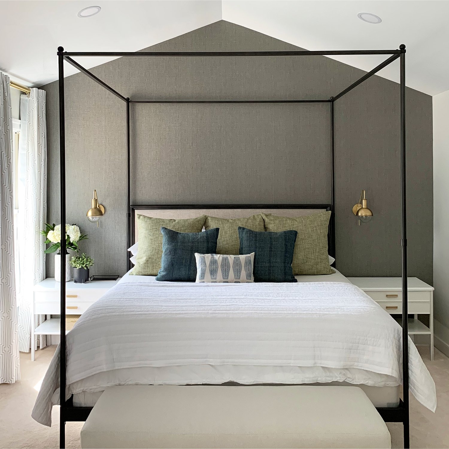 bedroom with accent pewter wall