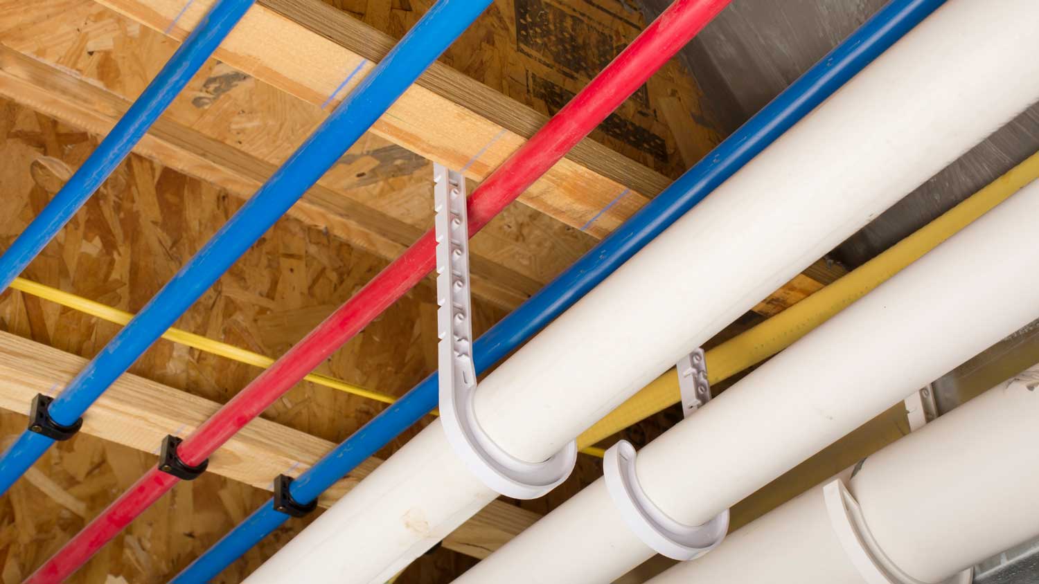 PEX pipes located in the basement’s ceiling