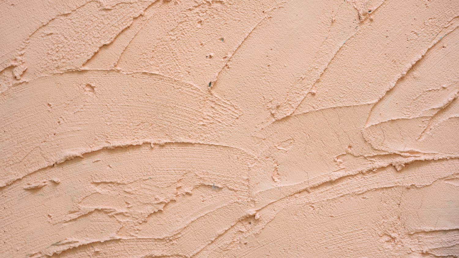 Pink cement stucco wall