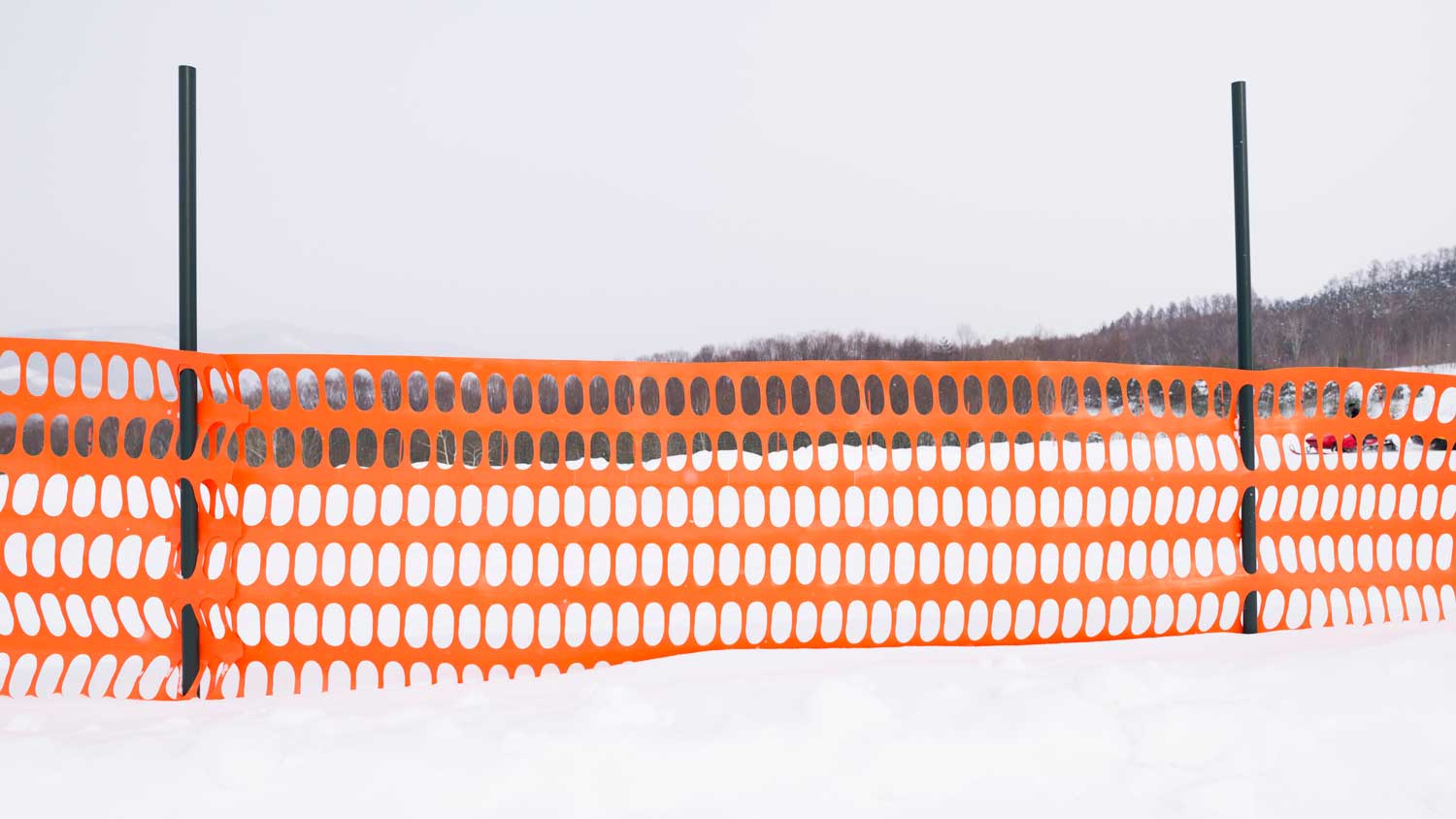 orange fence in the snow