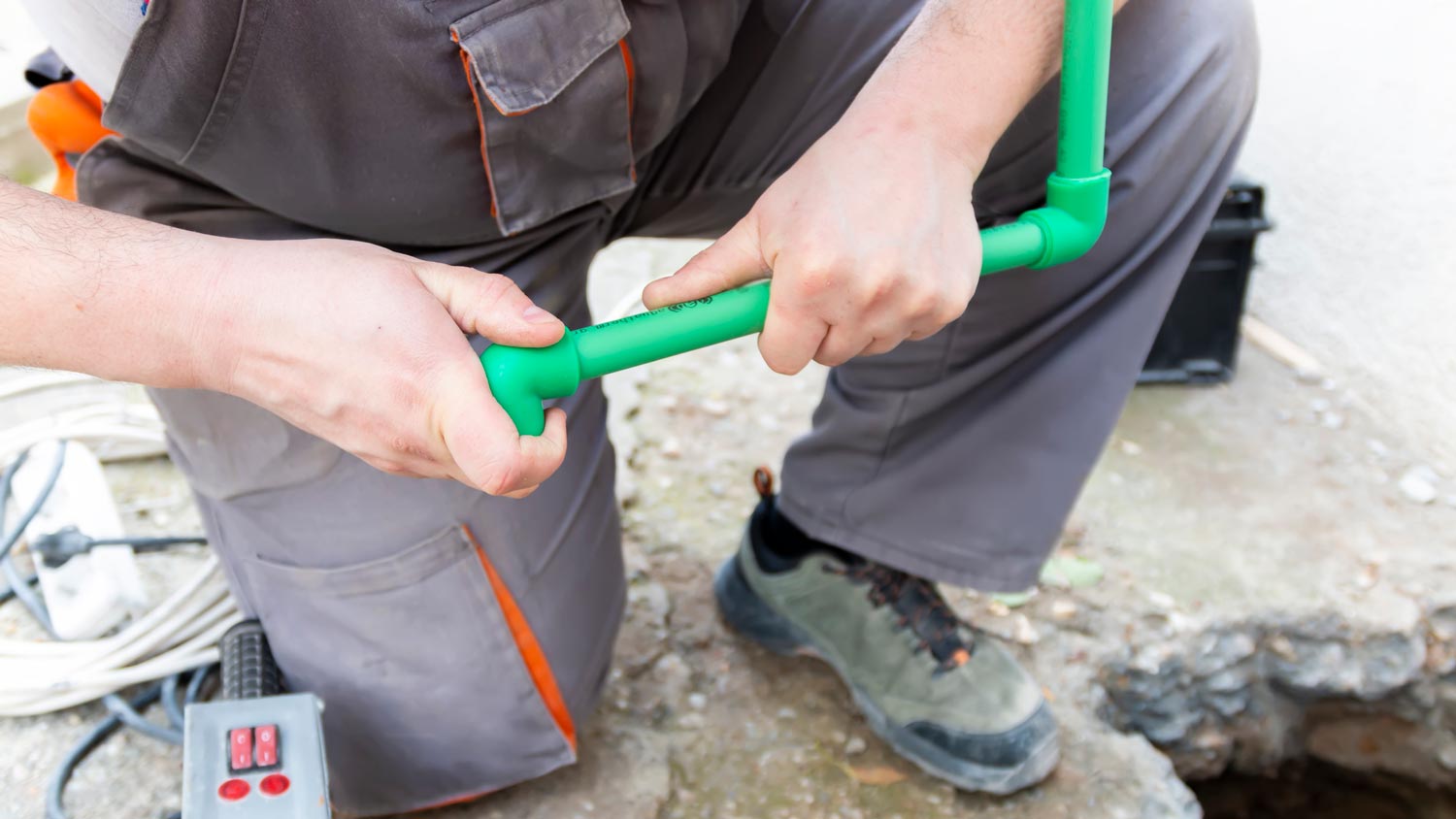 A plumber maintaining septic leach lines