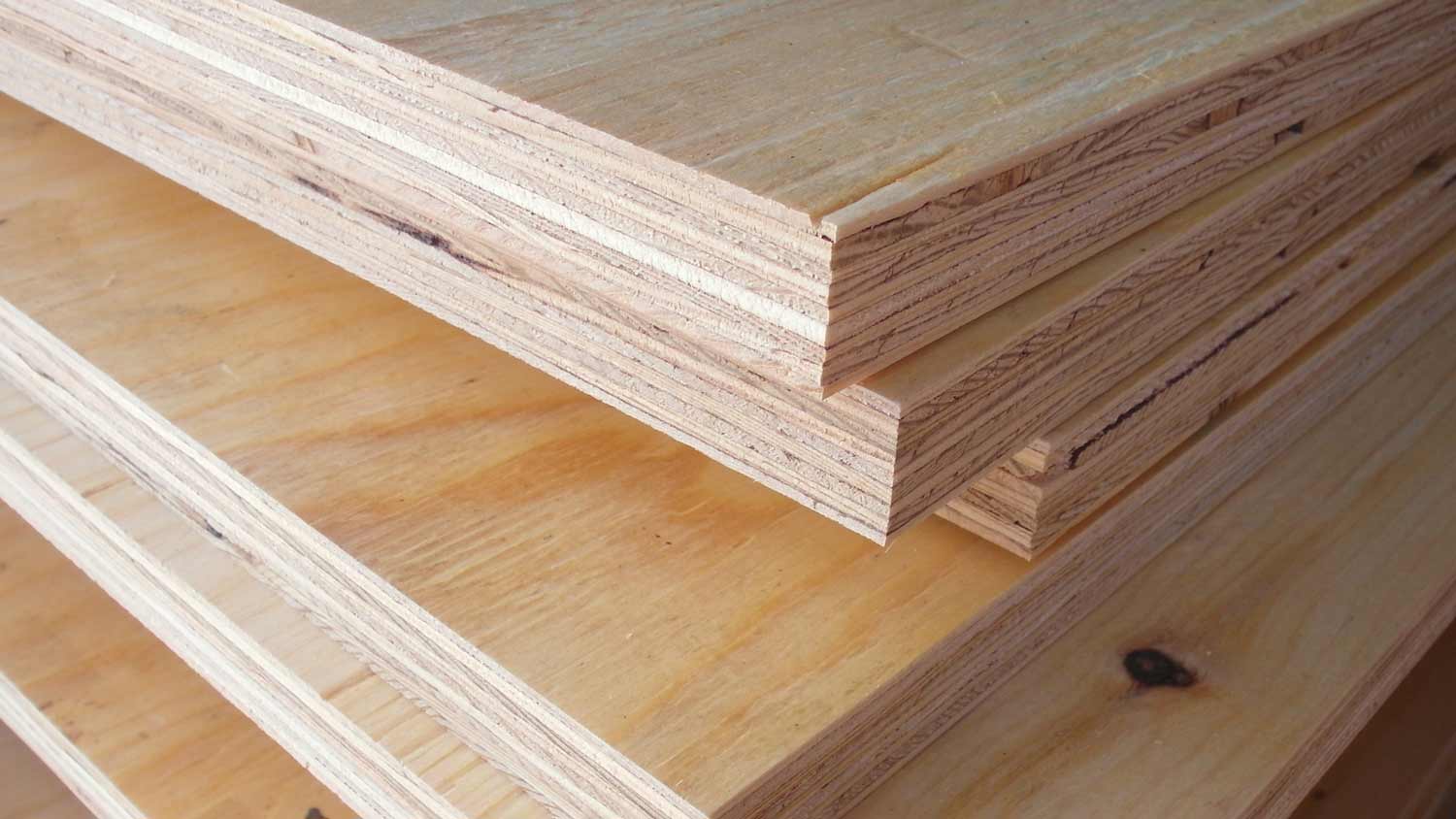 Plywood stacked on top of each other