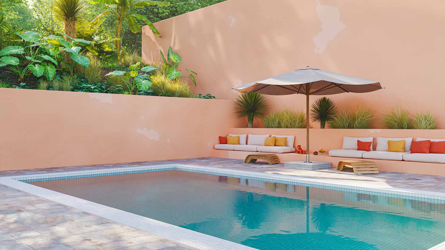A house’s pool area surrounded by tropical plants