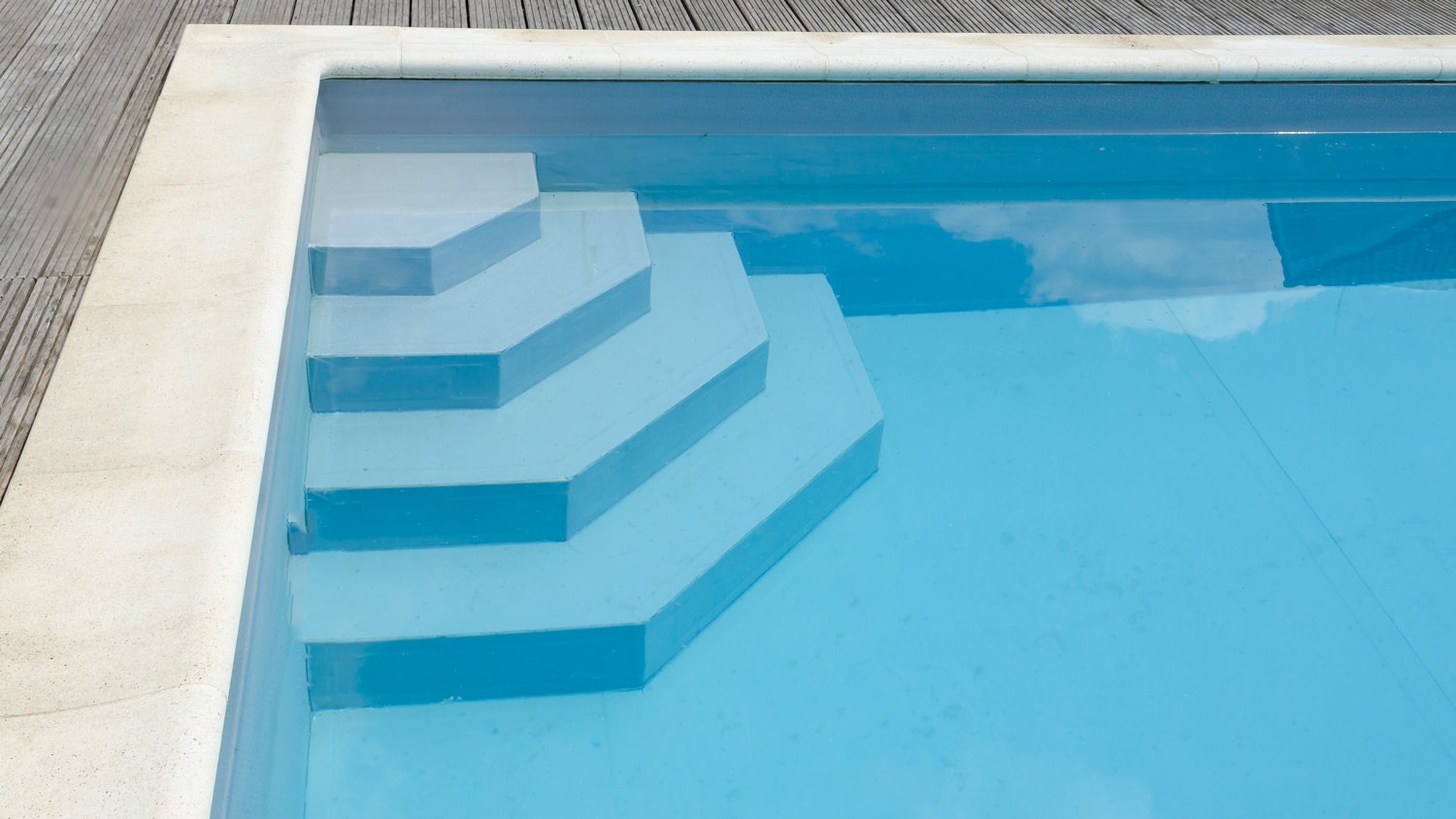 Clean swimming pool with stairs