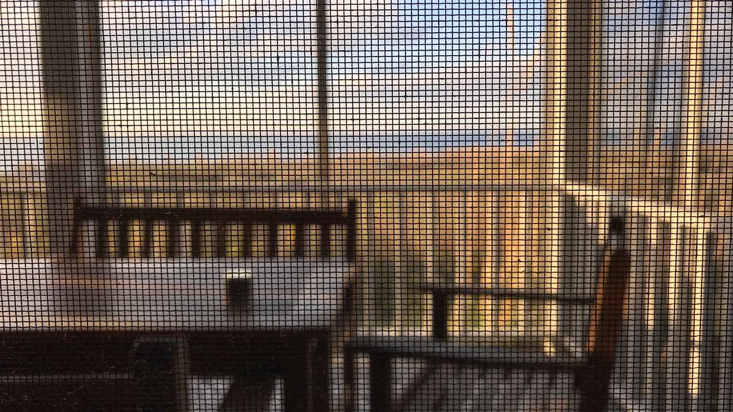 View through a fiberglass porch screen