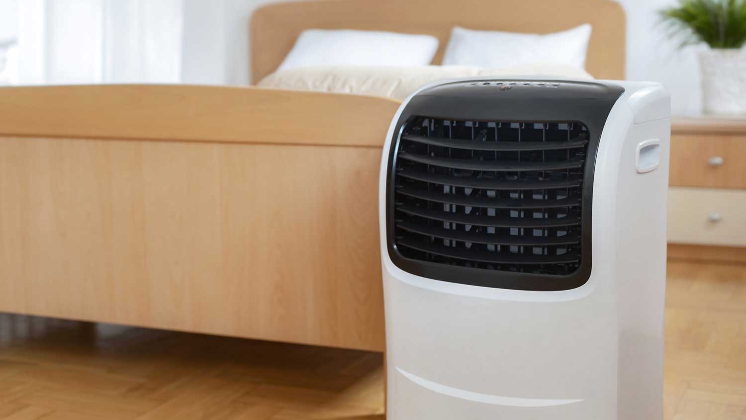 Portable air conditioner in a bedroom