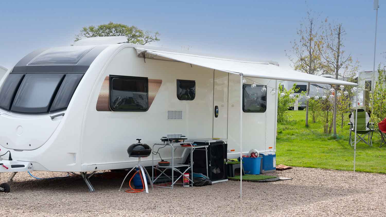 Portable awning installed next to the camper