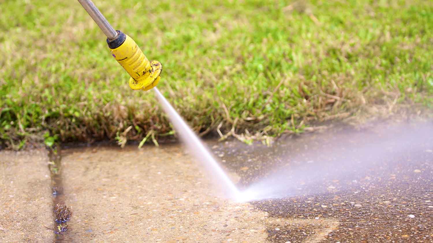 Water coming out of a pressure washer wand