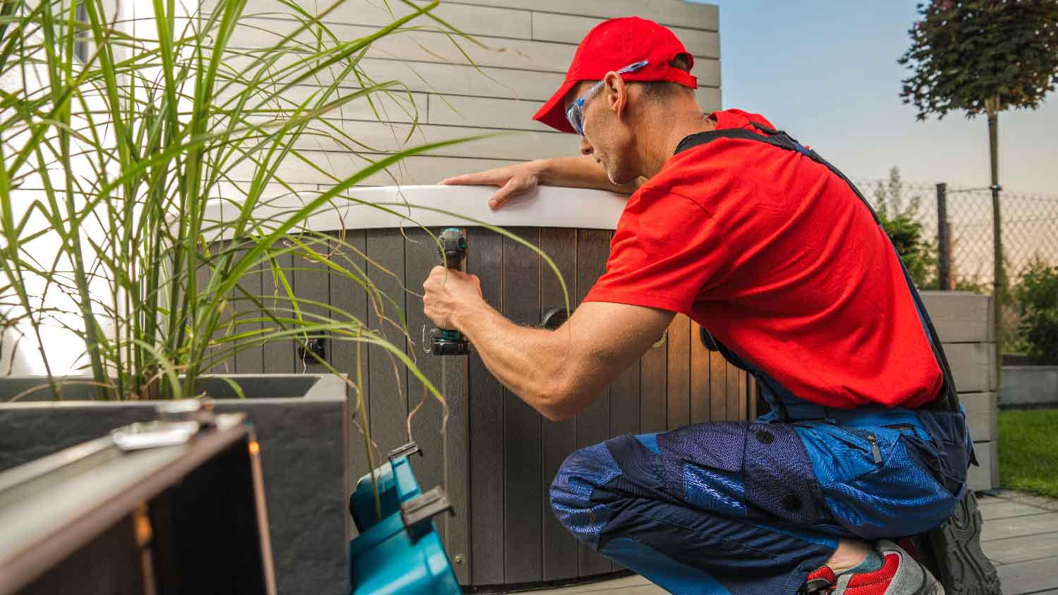 A professional installing a hot tub