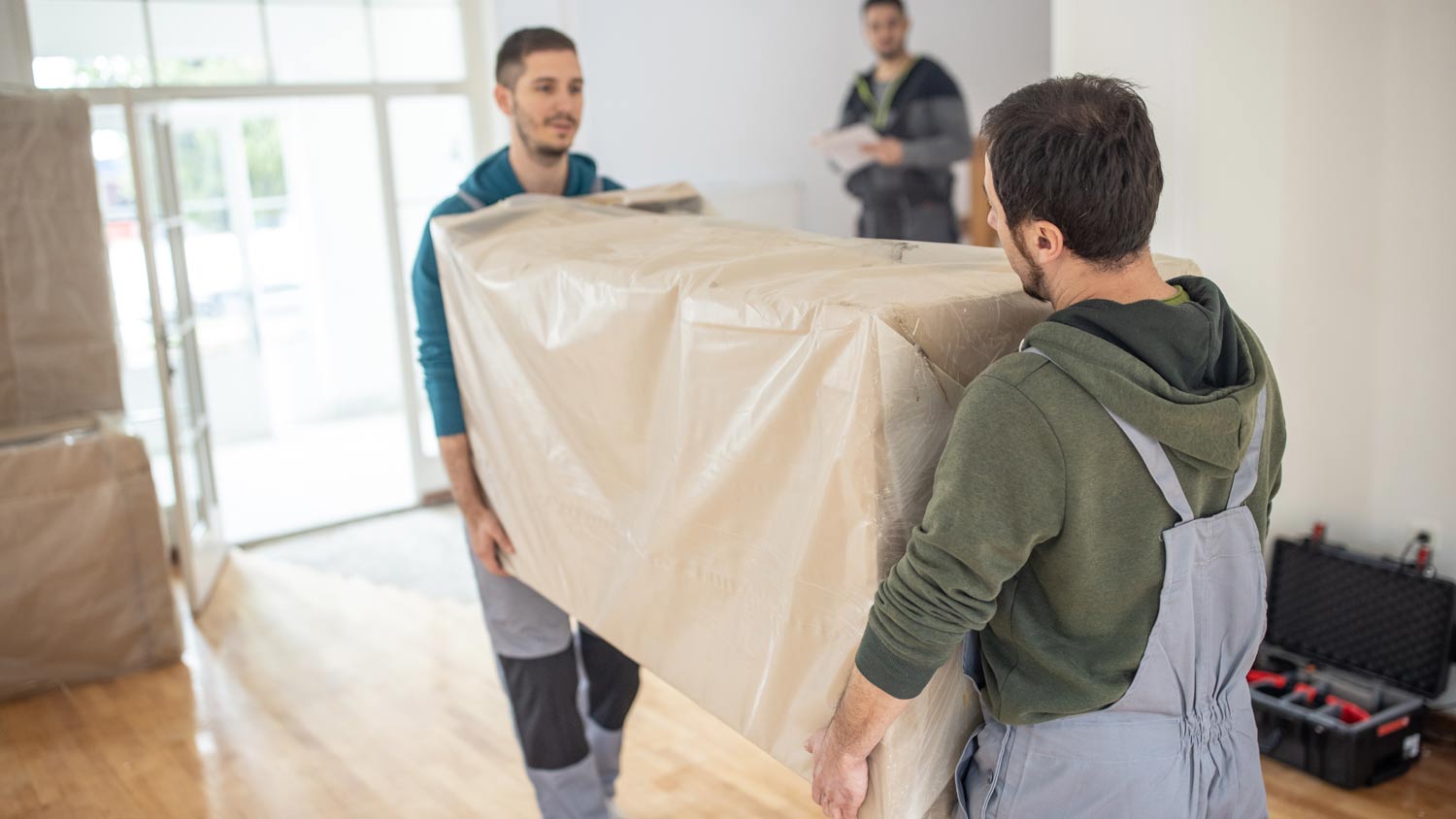 professional movers carrying furniture