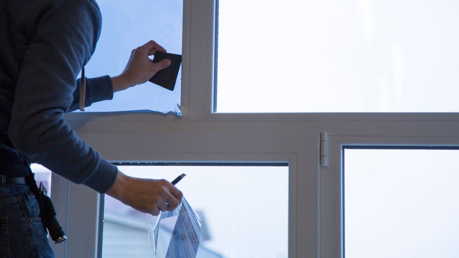 professional installing window film