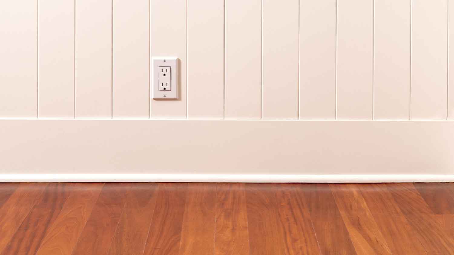 Quarter round trim sitting in front of a baseboard