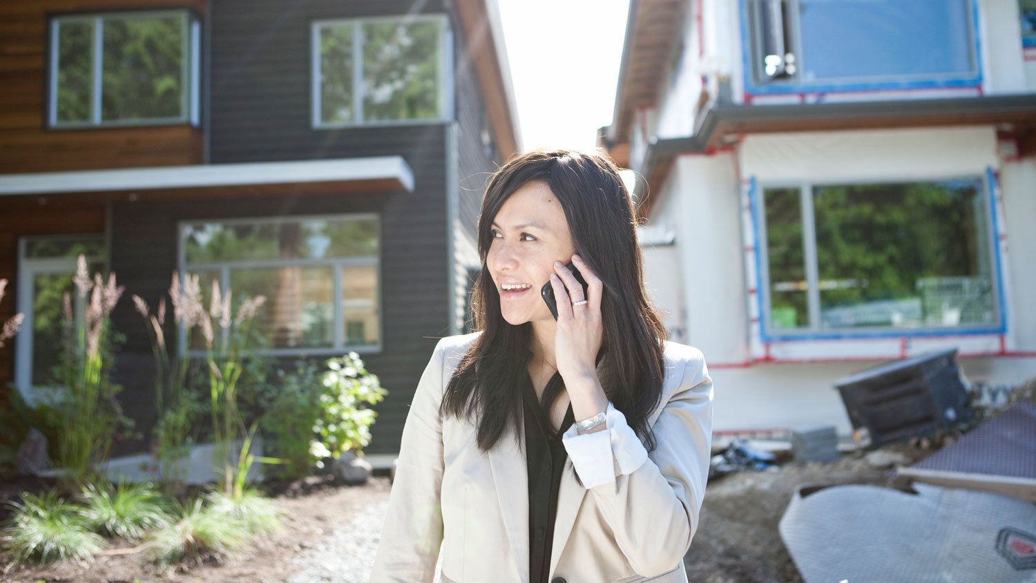 A realtor talking on the phone