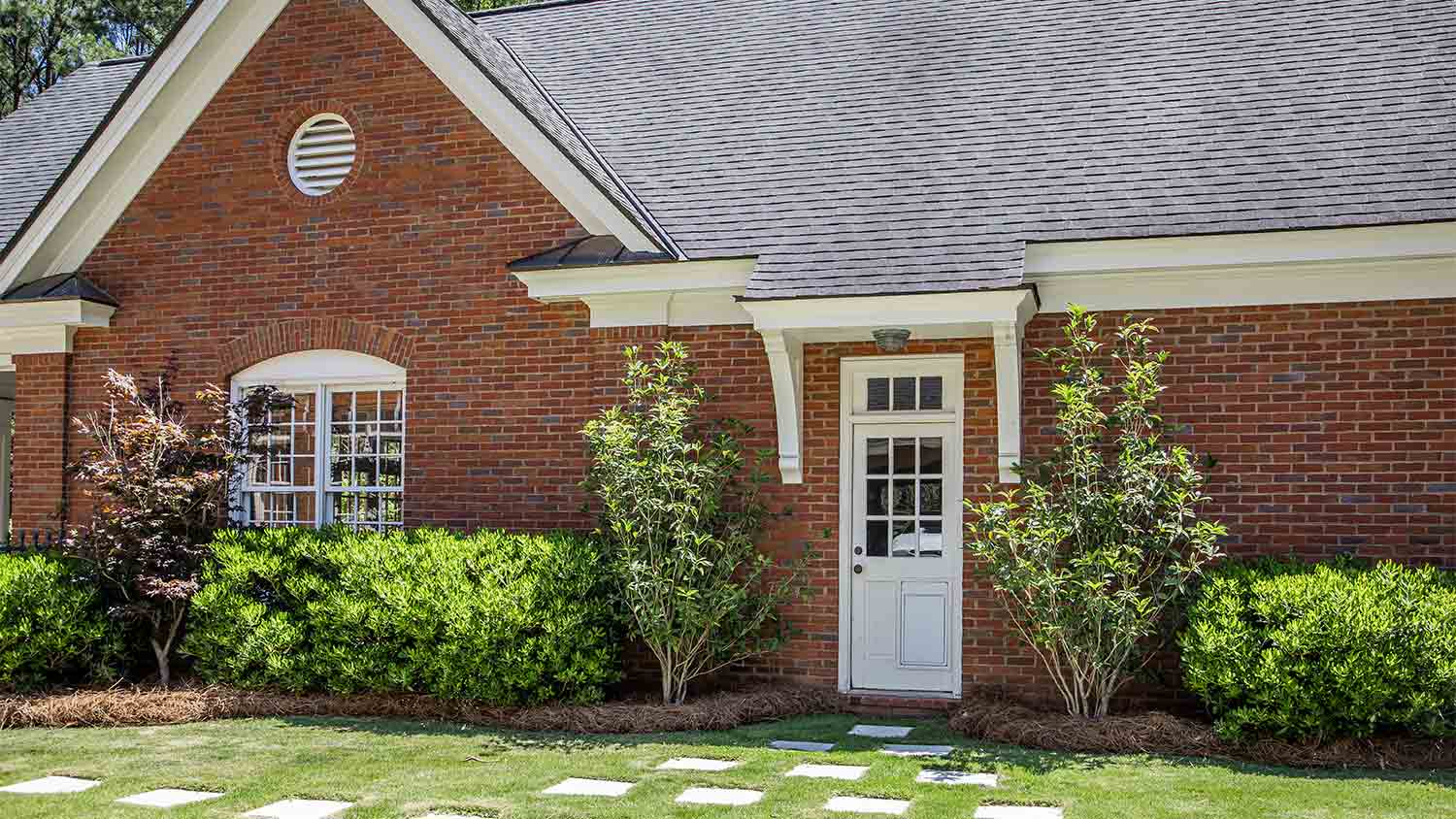 red brick siding on house