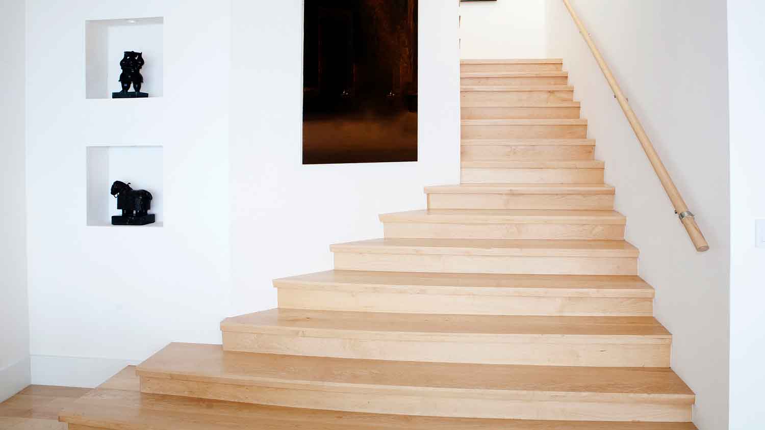 Wooden stairs with light color stain