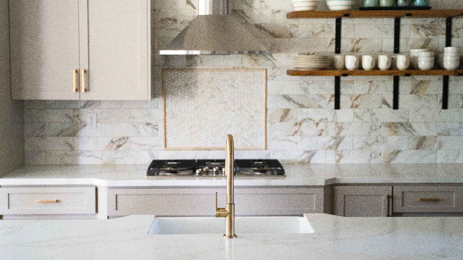  A remodeled kitchen with quartz countertops