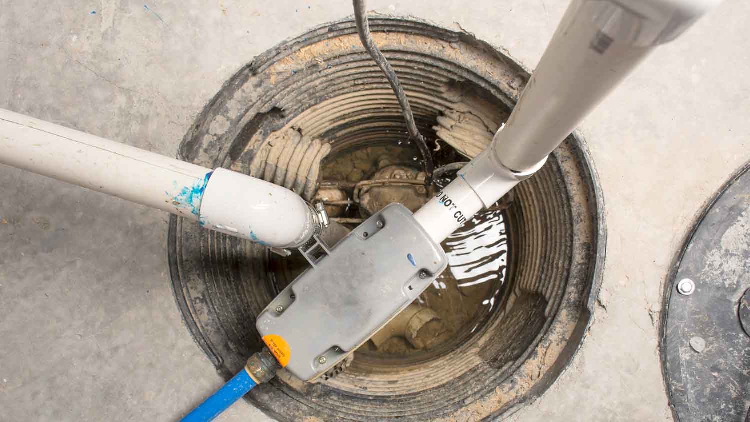 Sump pump installed in the basement of a house