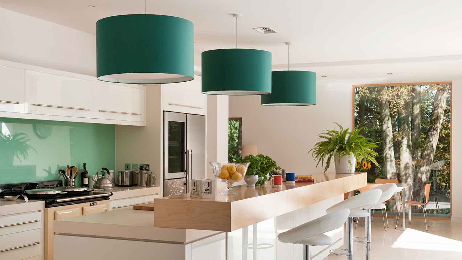 Retro pendant light fixtures over breakfast bar