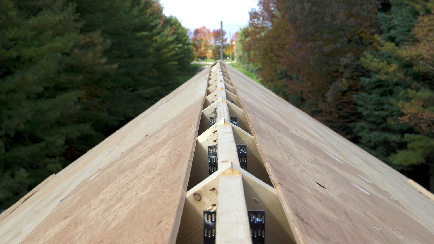 A ridge vent opening at the peak of a house’s roof