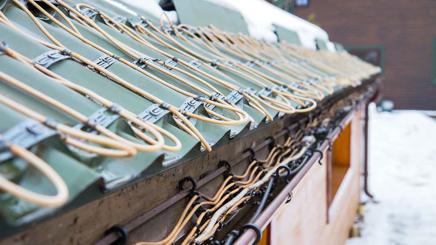 Heat cables installed on the roof of a house