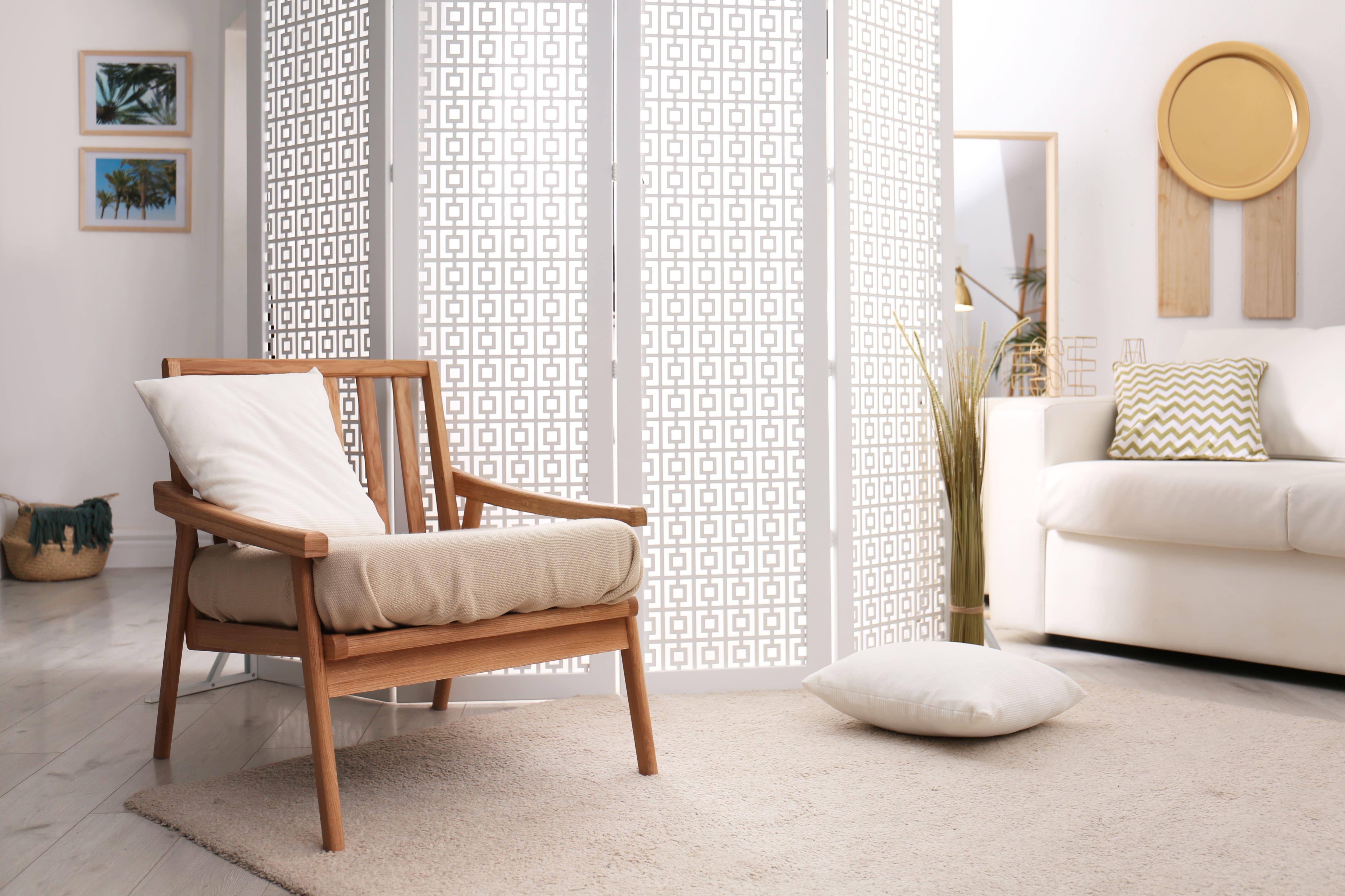 All-white interior with folding screen