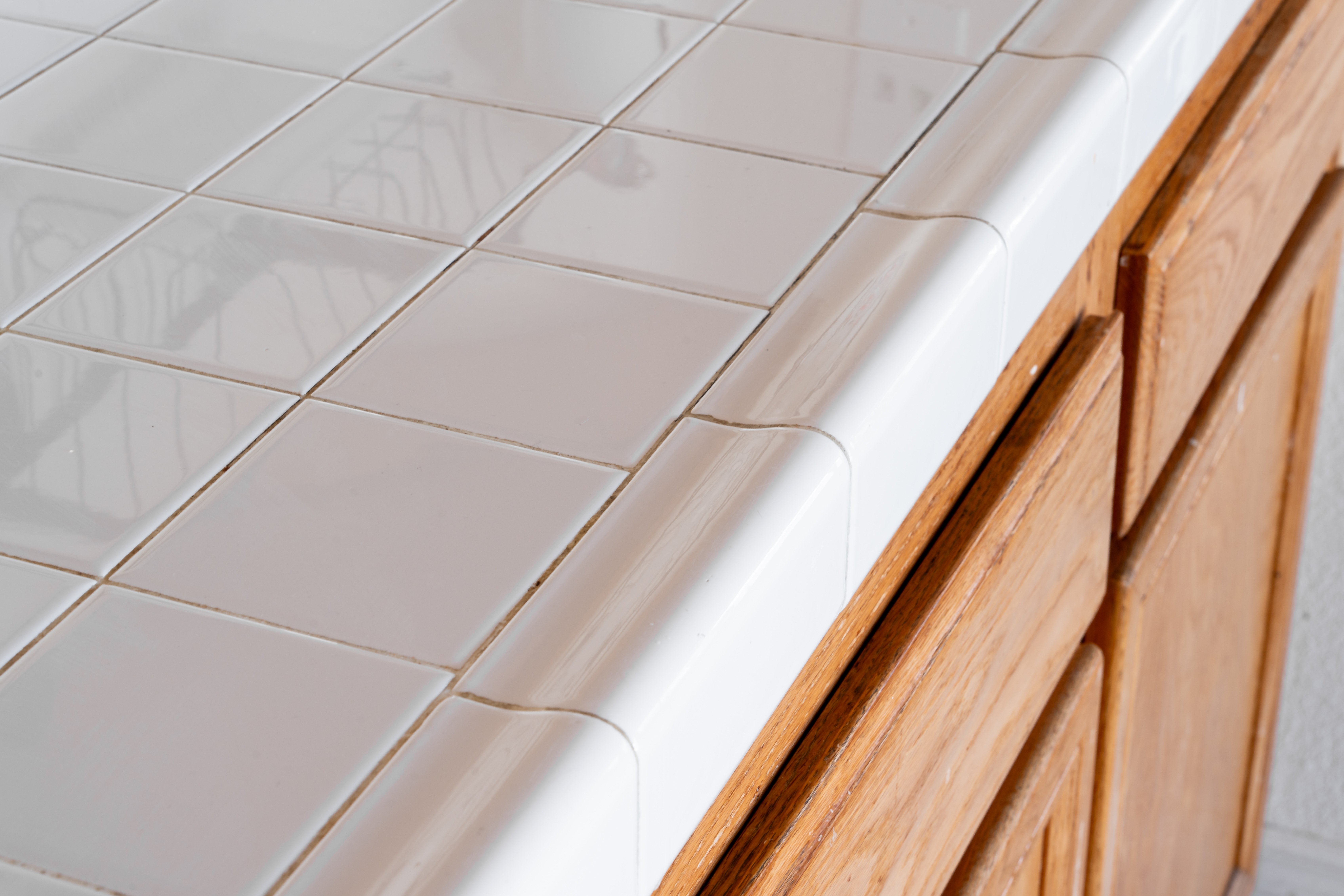 Closeup of cream tile countertop