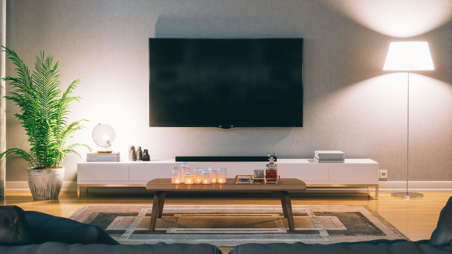 The interior of a scandinavian living room with a mounted TV unit