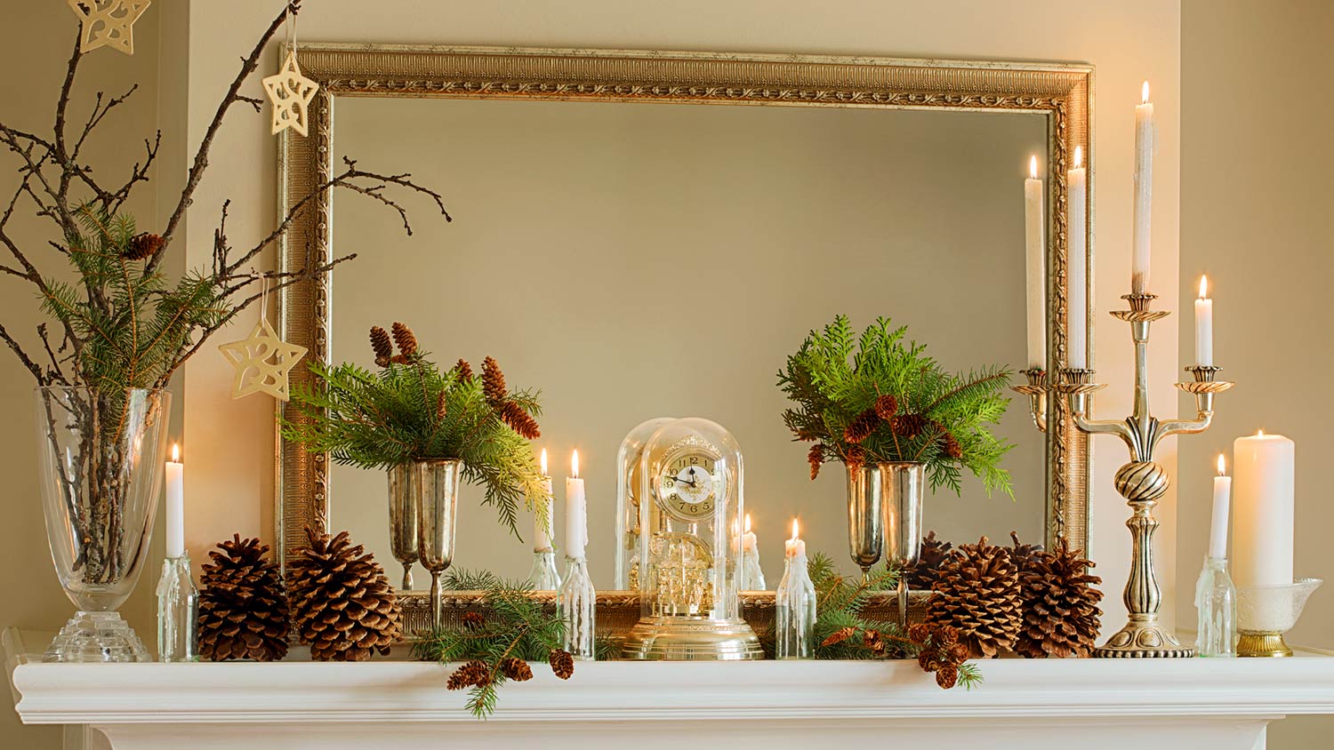 Seasonal fireplace decor on mantle over fireplace