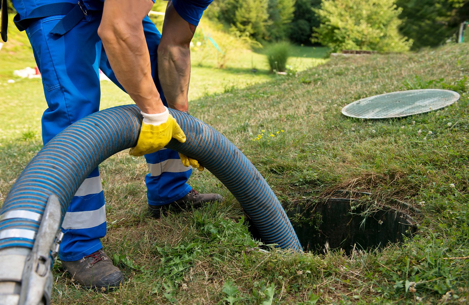 contractor fixing septic tank