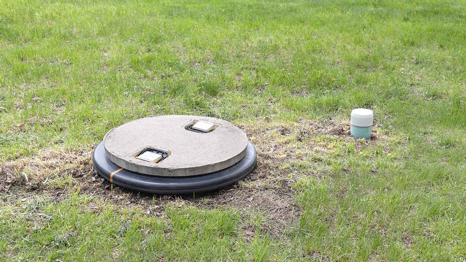 Septic system tank installed in the yard