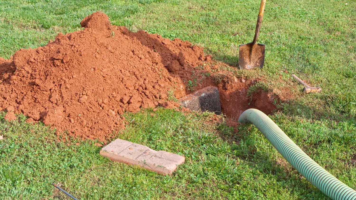 A septic tank being pumped out