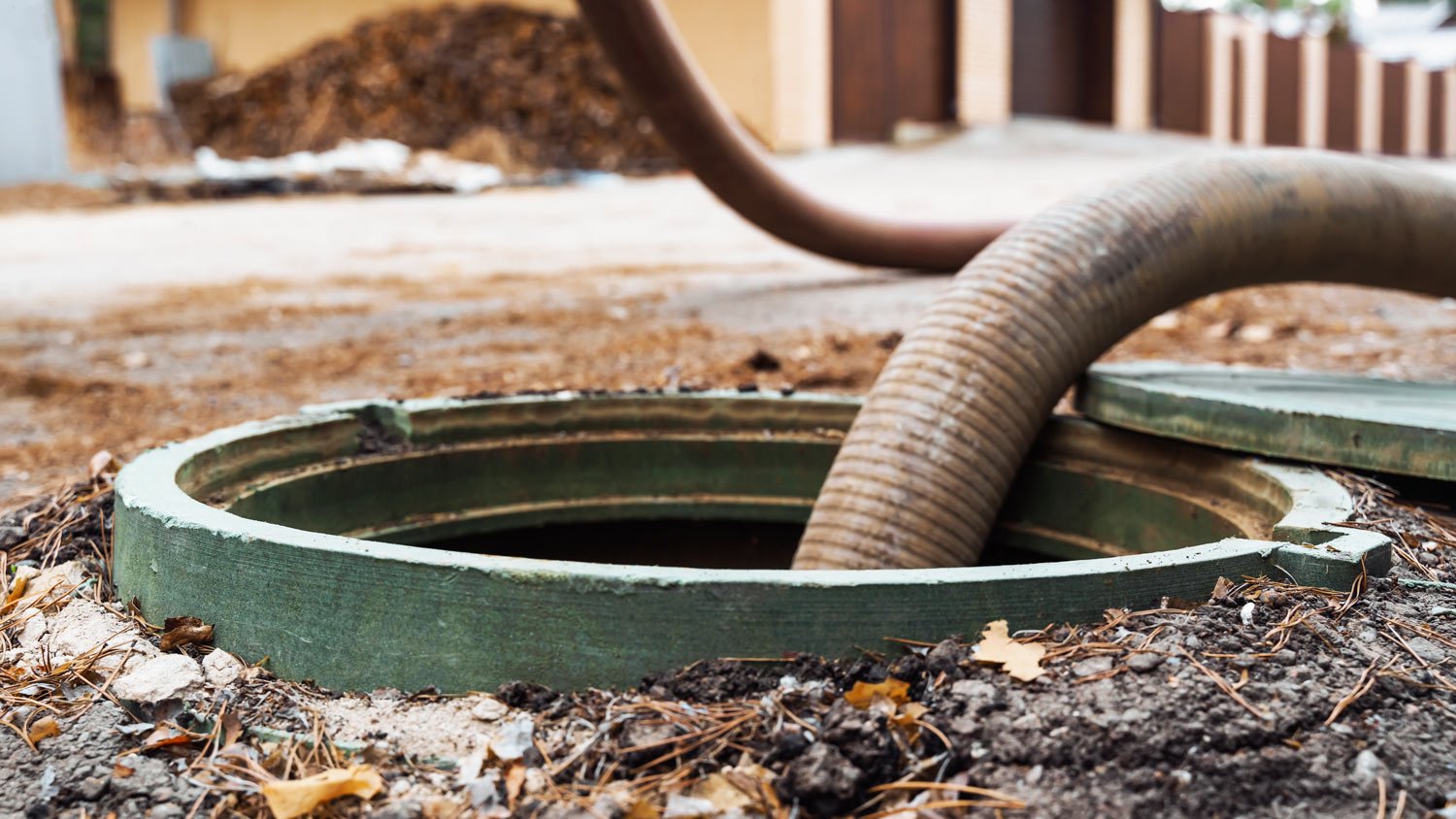 Pumping out sewage from a septic tank