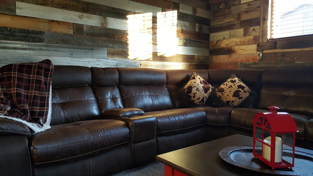 Family room with reclaimed wood walls