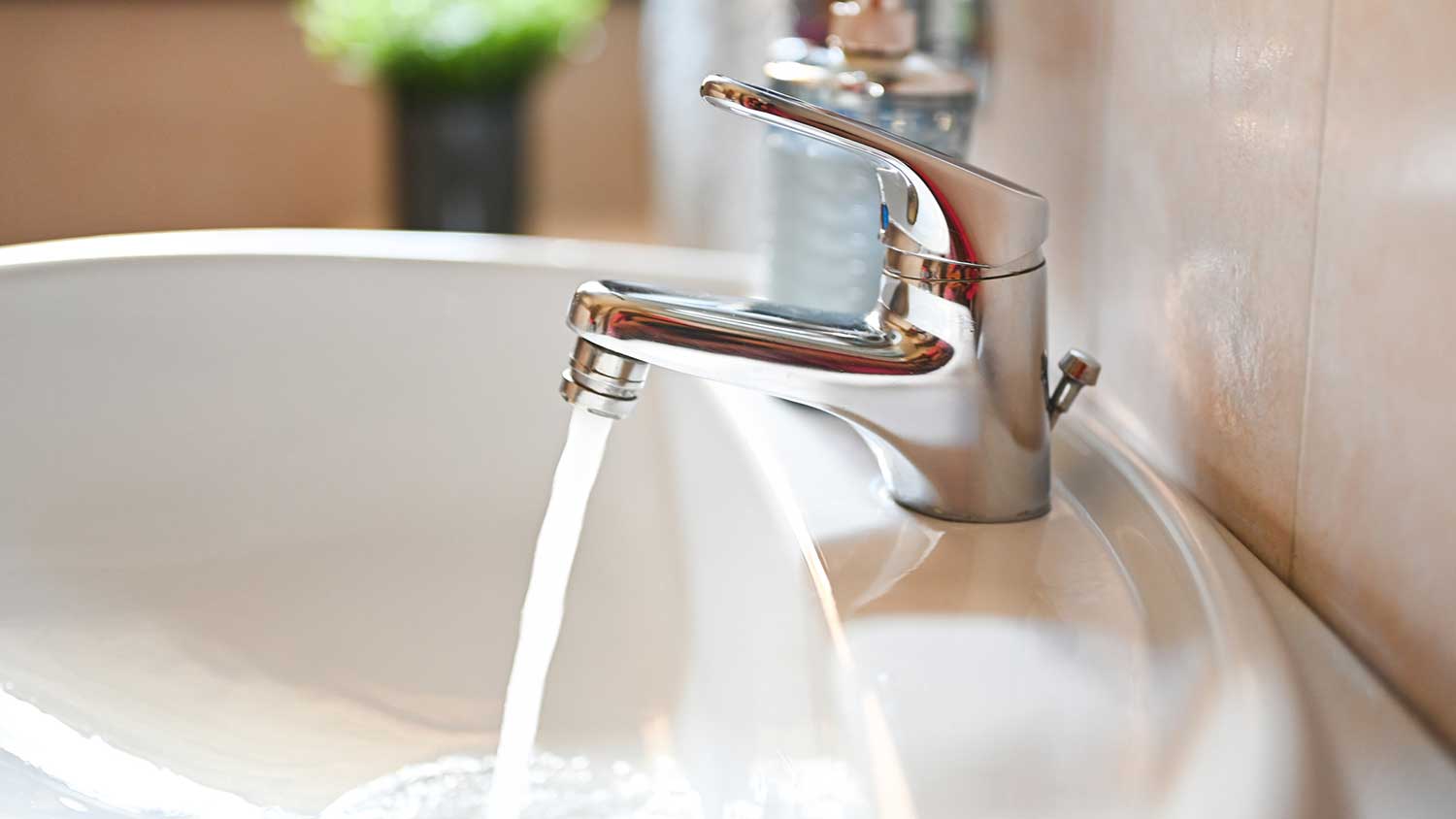 Water coming out of a bathroom faucet