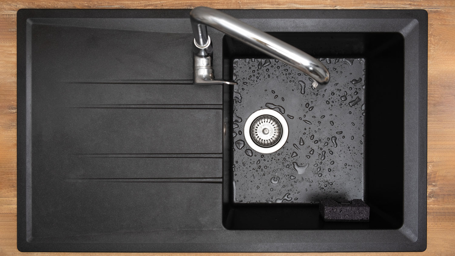 Overhead view of black sink