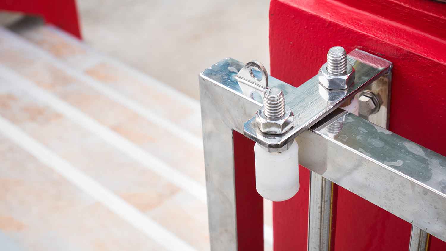 Rollers installed on top of a sliding door