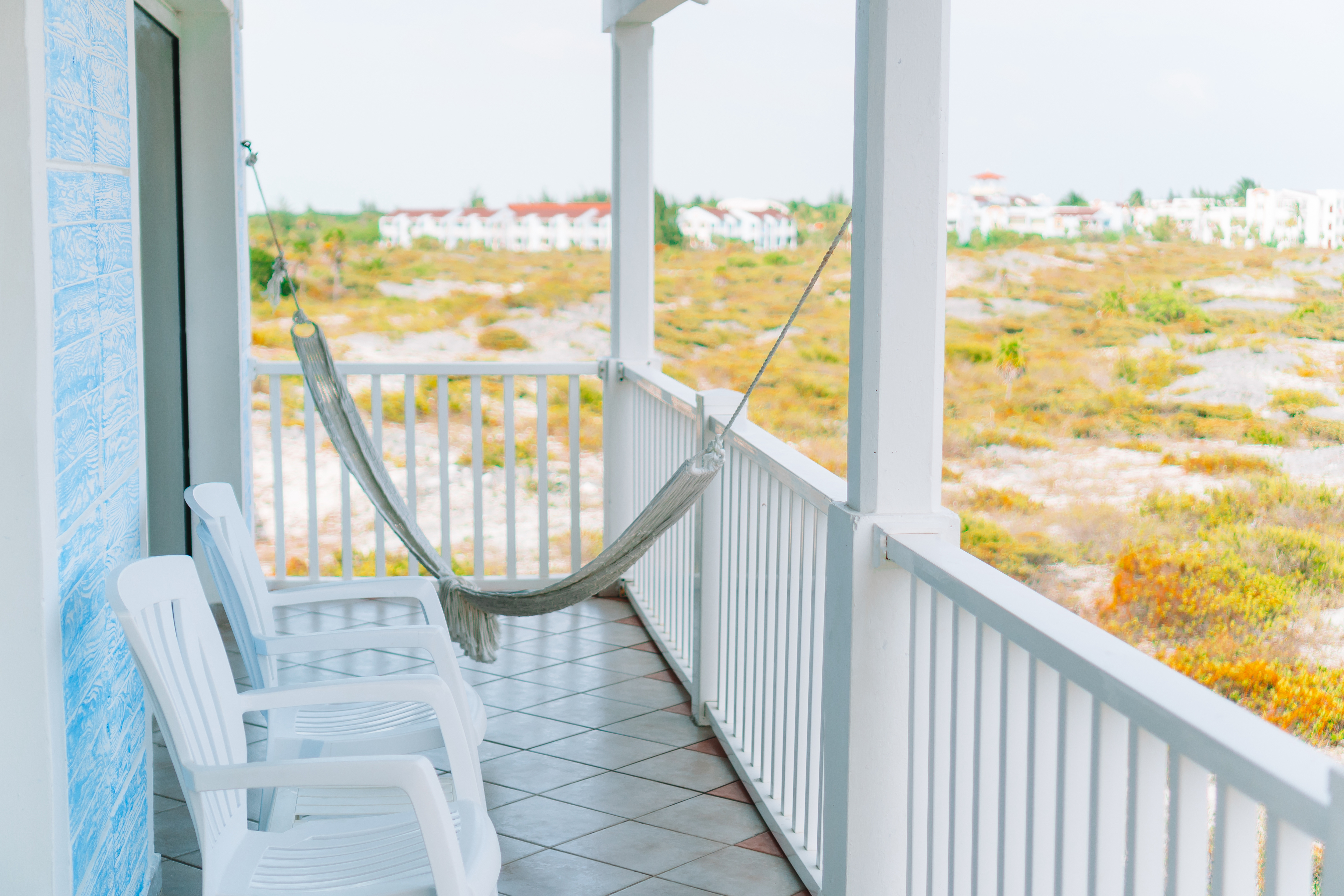 Hammock suspended from small balcony