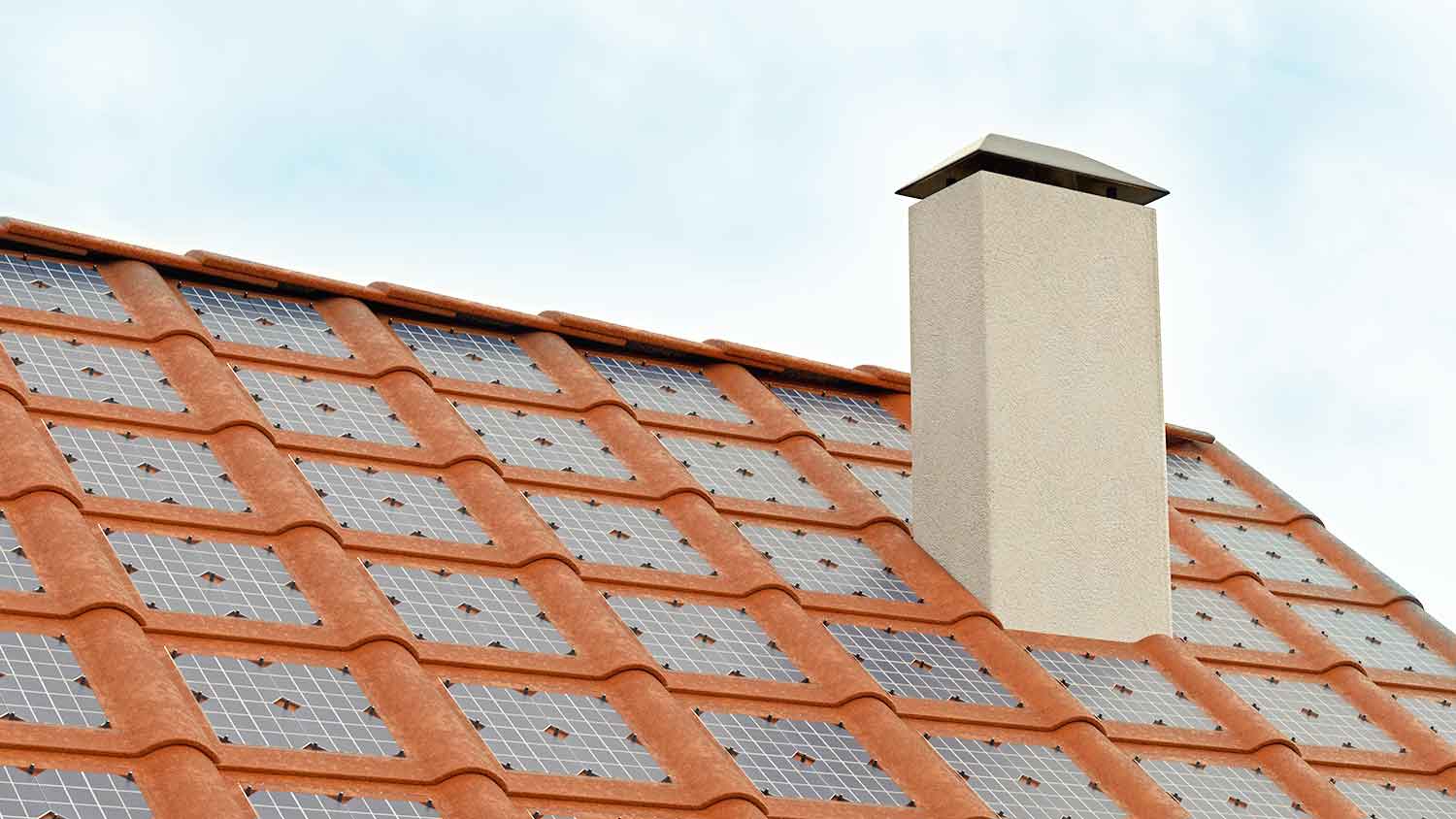 Solar roof shingles installed on the roof of the house