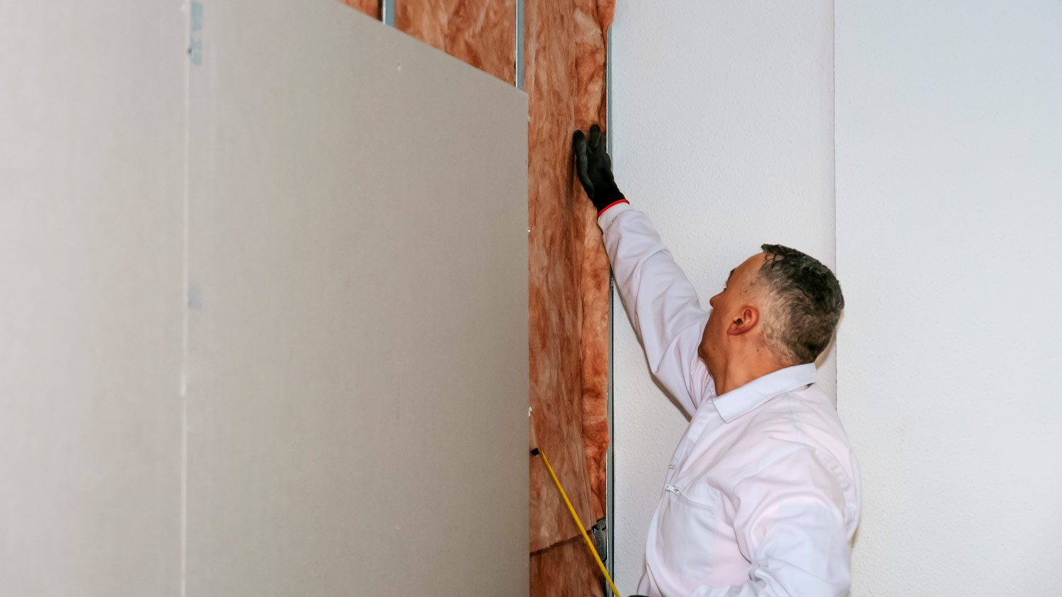 worker soundproofing house