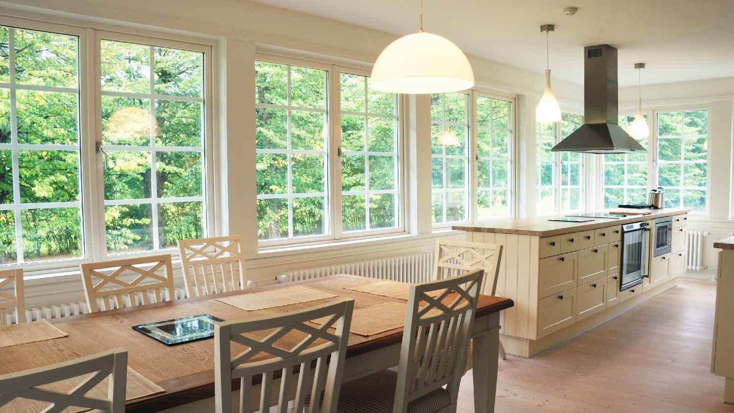 A spacious kitchen with large windows