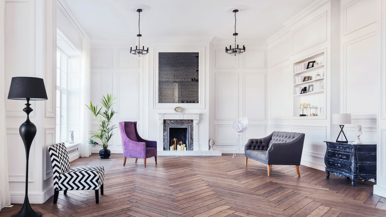 A spacious stylish living room with parquet floors