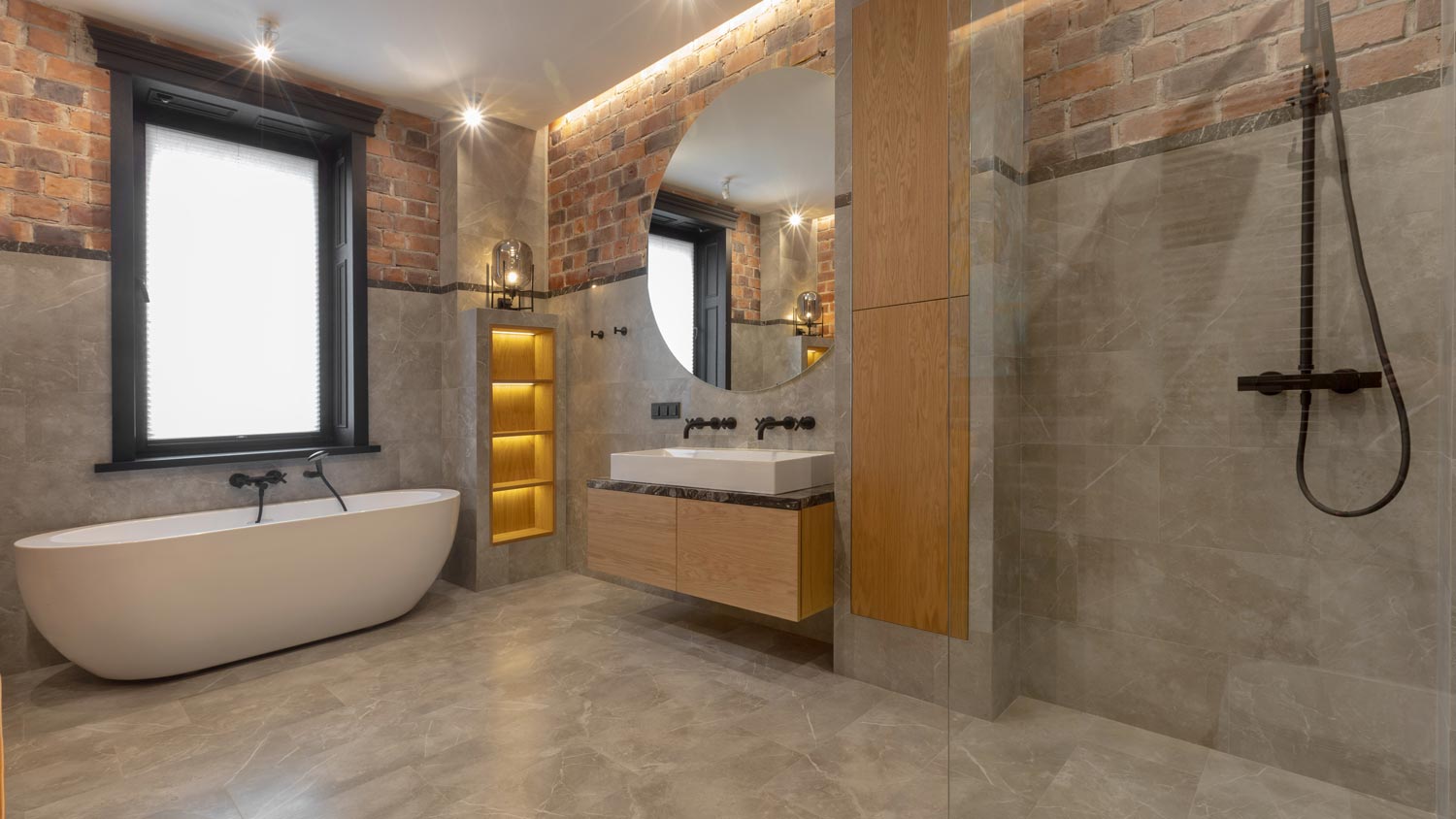 A spacious wet room with a modern bathtub