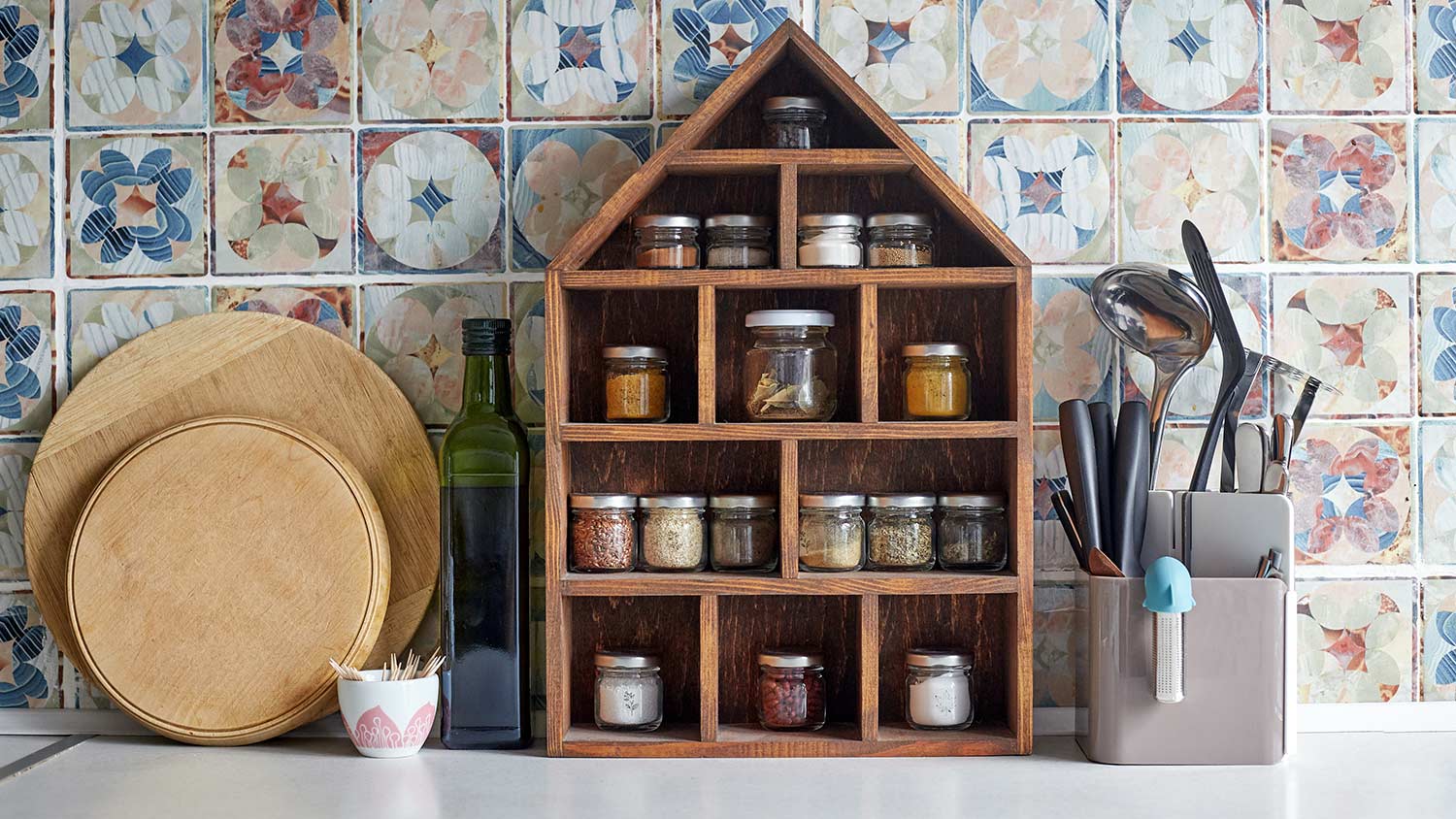 Spices on shelf on kitchen counter