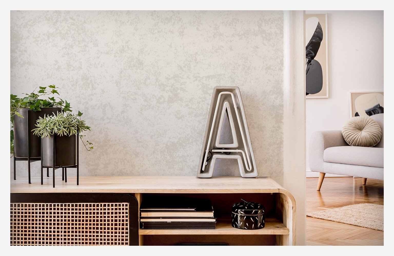 wall painted with sponge technique above table in home walkway 