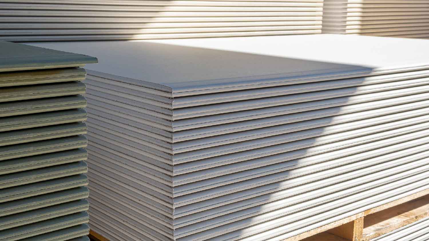 A stack of drywall sheets