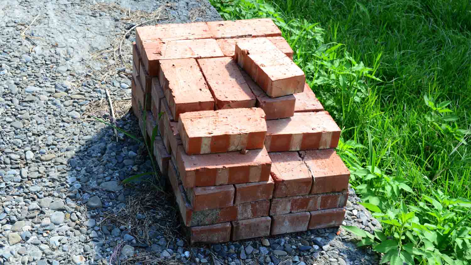 stack of bricks in yard