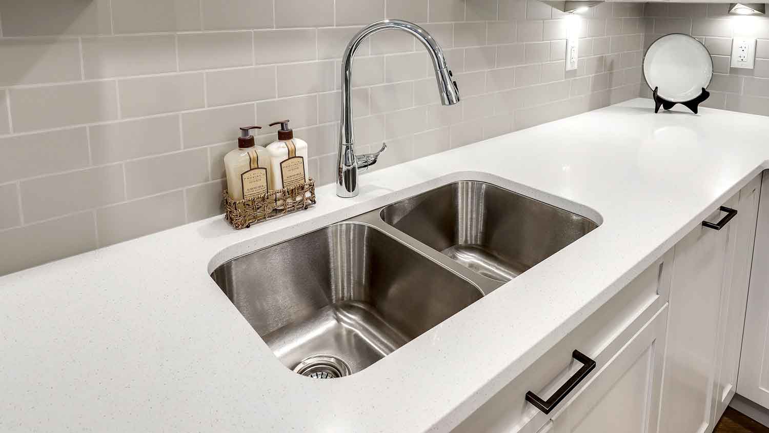 Stainless double sink installed in the kitchen