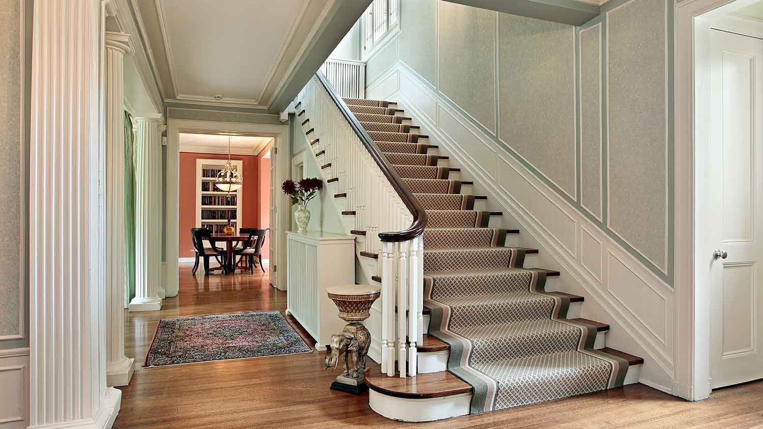 Classic style staircase with stair runner