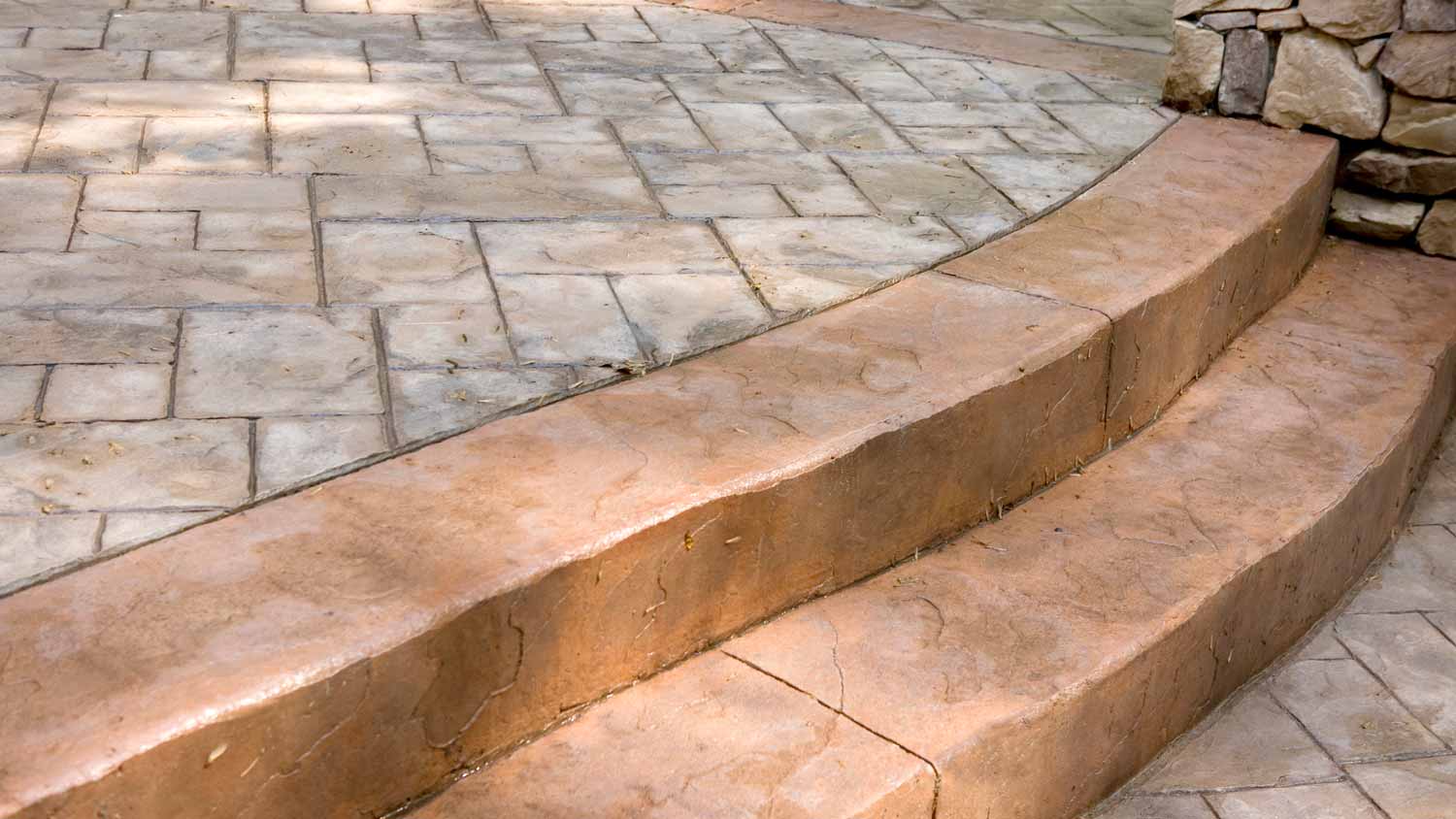 A mix of stamped and colored concrete